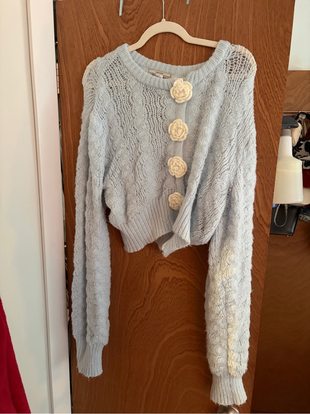 Kimchi Blue Light Blue Cropped Knit Cardigan with Cream Floral Buttons